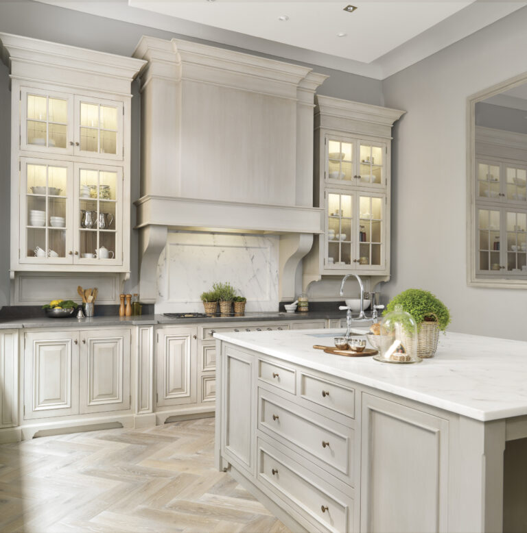 Hand-painted kitchen with island, Carrara marble splashback and worktop, and herringbone timber floor