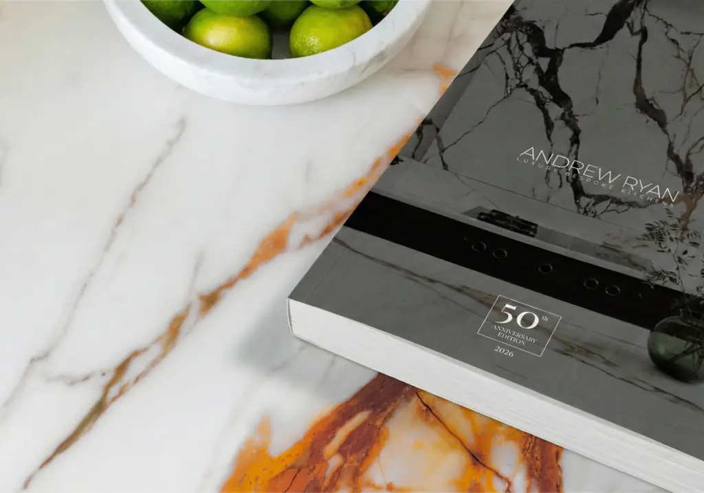 This is a functional image (brochure CTA link), so the alt text should describe its purpose rather than the visual details. Download the Andrew Ryan 50th Anniversary Edition brochure