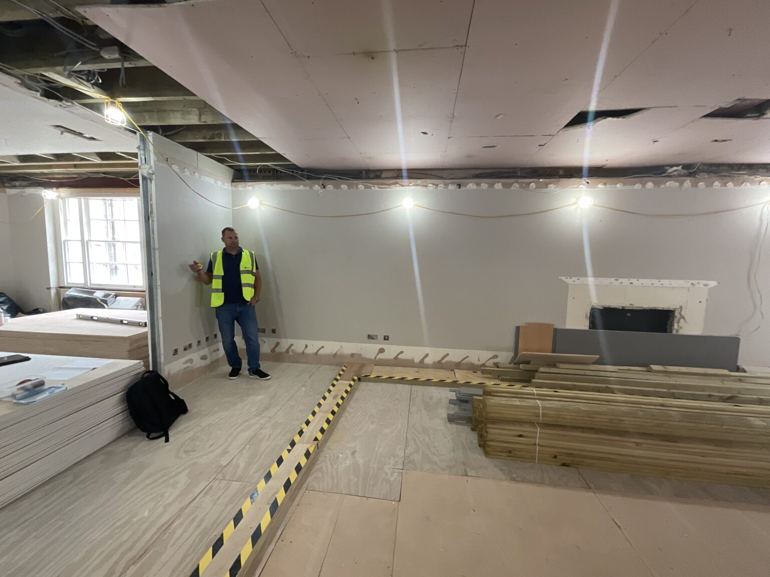 The bar and lounge space during the strip-out, before the new joinery was installed