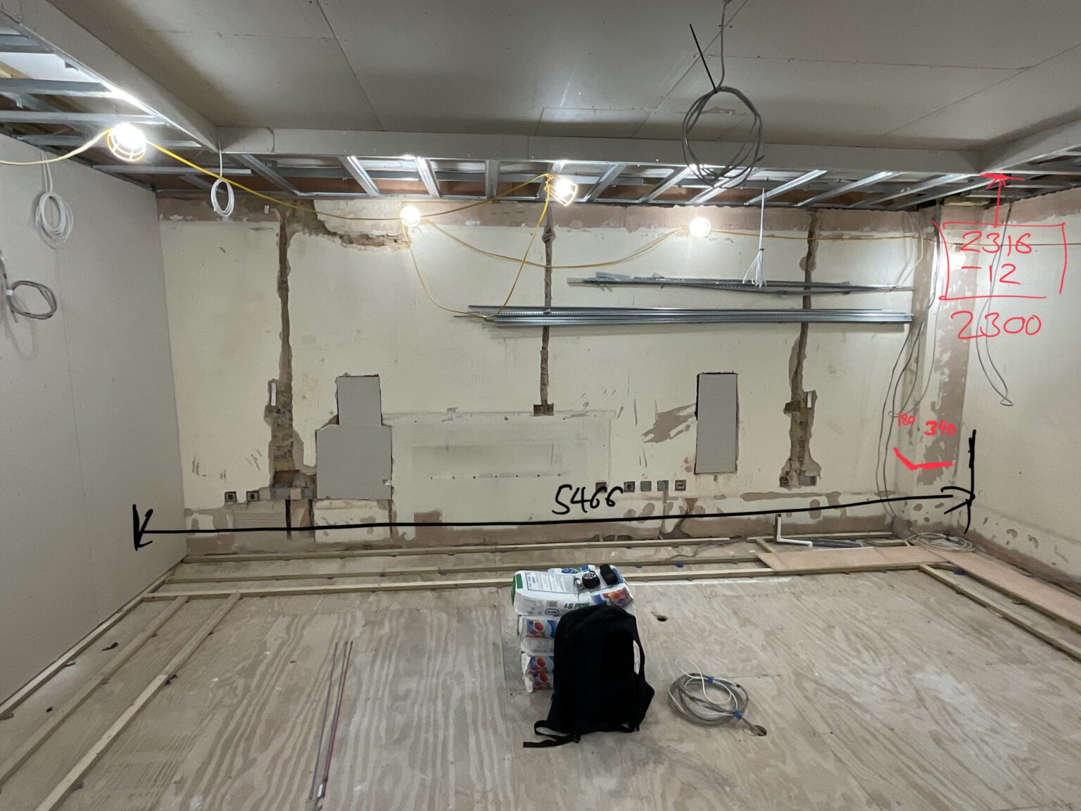 The dressing room space during the build, with ceiling framing and services exposed