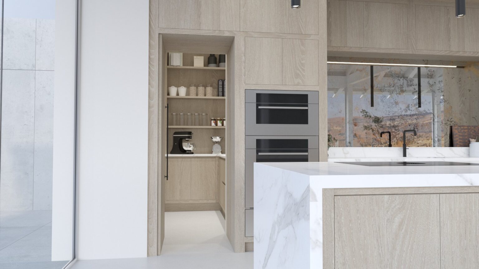 Light oak kitchen with a stone-topped island, built-in double oven and a hidden pantry with open shelving