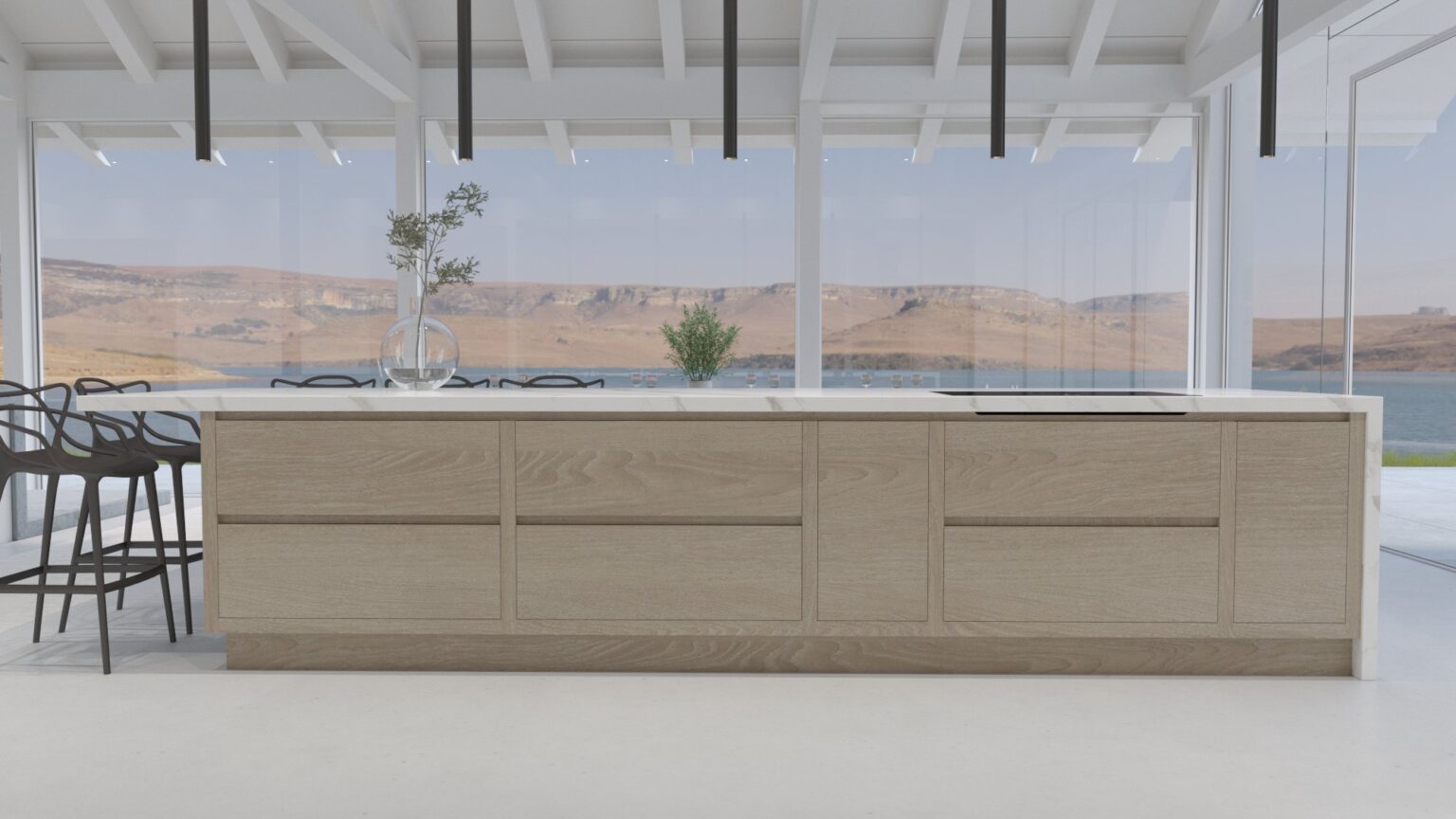 Large kitchen island with timber cabinetry and pale worktop, set before floor-to-ceiling glazing overlooking the water