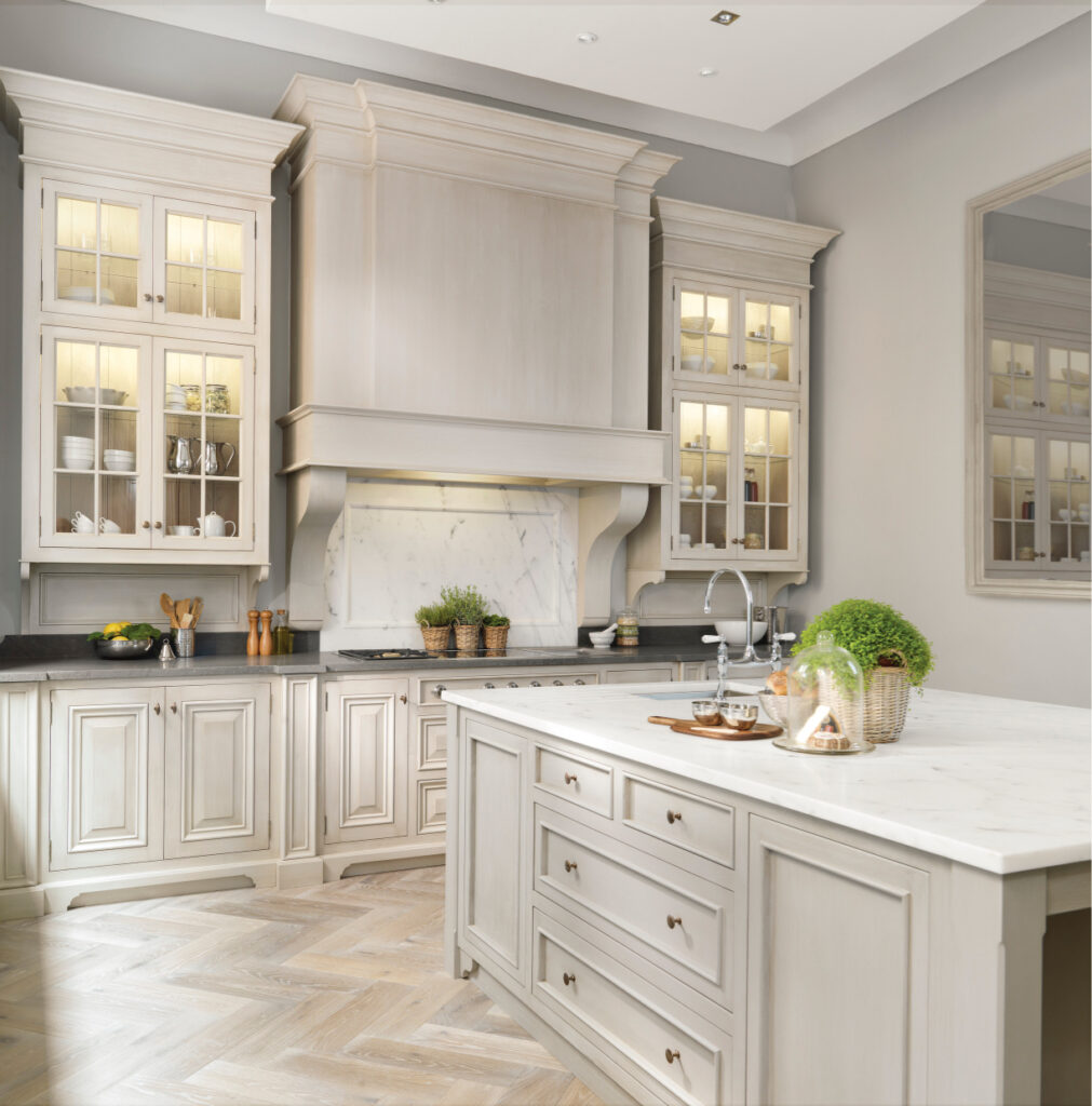 Monaco hand-painted kitchen display with a canopy and marble worktops in the Altrincham showroom